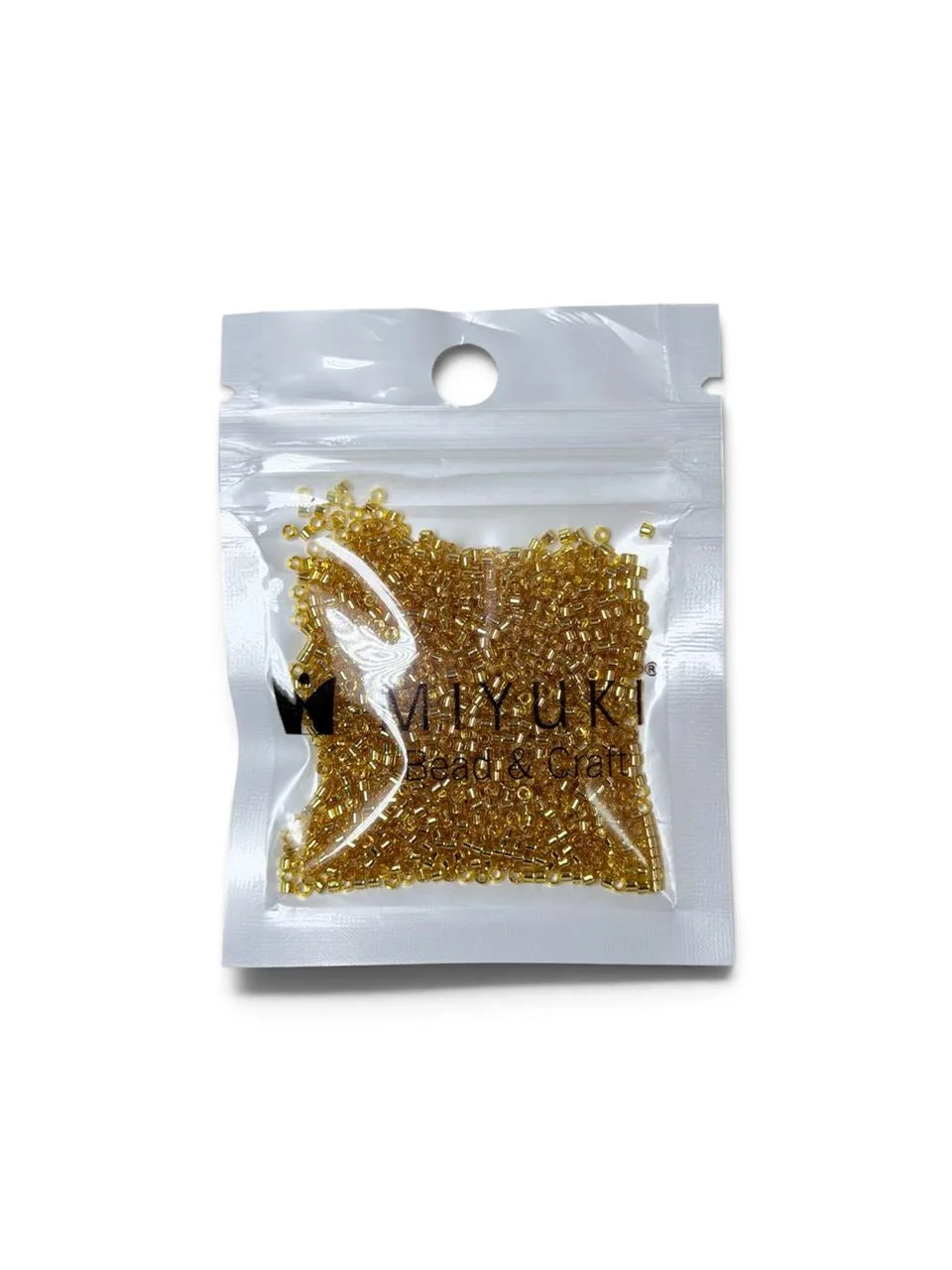Miyuki Delica 11/0 - Gold Lined Crystal. 10g