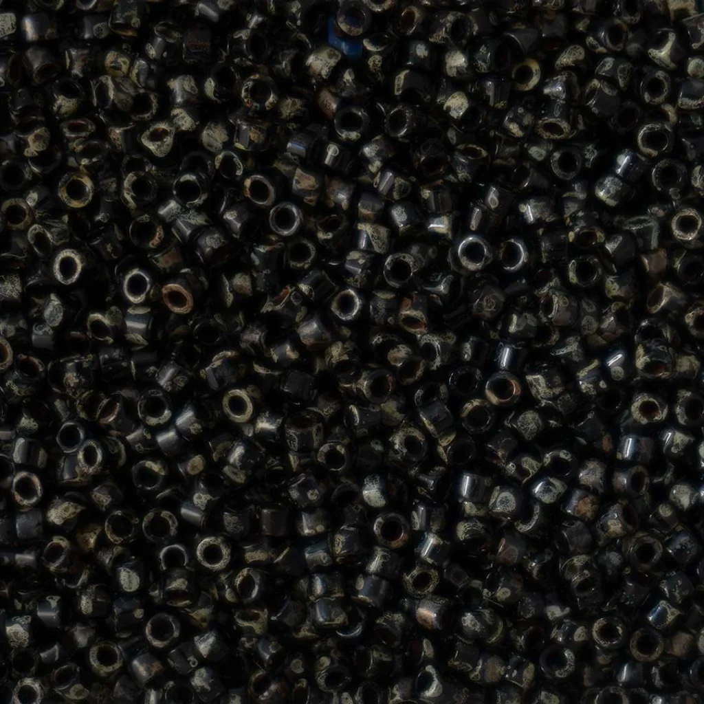 (DB2261) Miyuki Delica 11/0 - Opaq Black Picasso. 10g