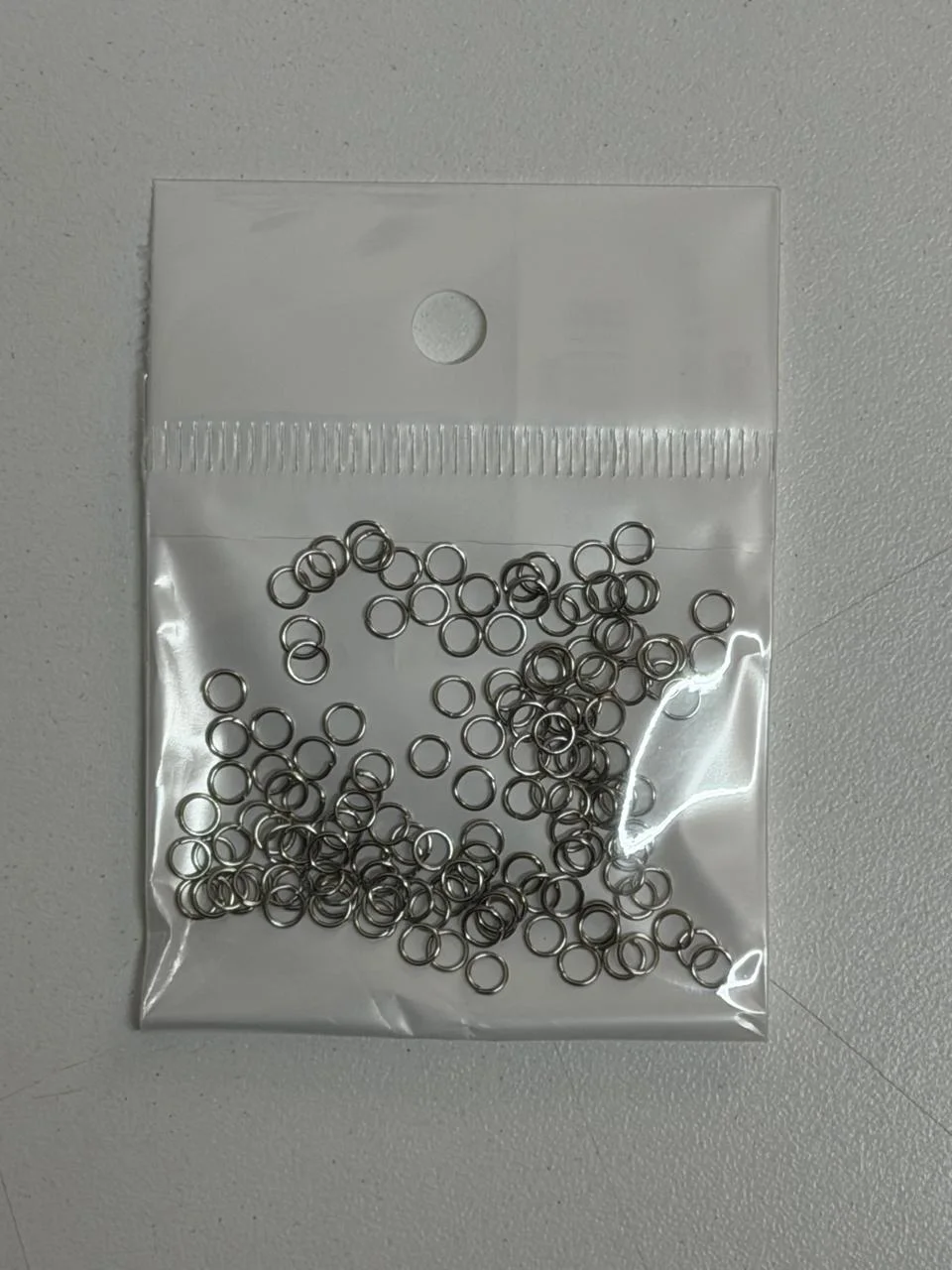 AQ Argollitas de union 3,5mm. 150u aprox